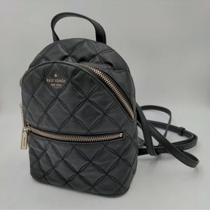 Kate Spade Mini-Backpack paid $180 used once.